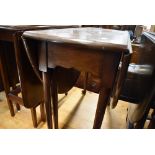 An early 20th Century mahogany gateleg table on cabriole legs