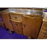 A mid 20th Century oak and ply sideboard, width approx. 122cm