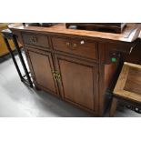 An Oriental hardwood sideboard/buffet/bar, approx dimensions. W128 H94 D46cm (one handle off but