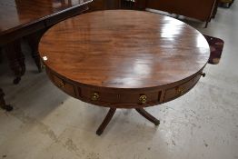 A nice quality late 19th or early 20th Century Regency revival mahogany drum table having