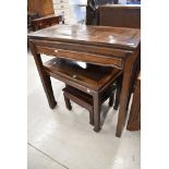 Three Oriental hardwood occasional side tables of similar design and reducing sizes, W89,68 and 40cm