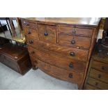 A 19th Century mahogany and inlaid bow fronted chest, having interesting configuration of five
