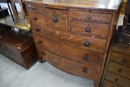 A 19th Century mahogany and inlaid bow fronted chest, having interesting configuration of five