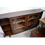 A reproduction mahogany low bookcase/display cabinet, width approx. 153cm