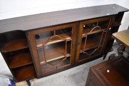 A reproduction mahogany low bookcase/display cabinet, width approx. 153cm