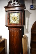 A 19th Century mahogany longcase clock having brass and silvered dial, named Burton, Kendal with 8