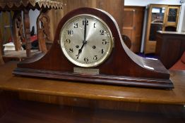 A 1920s mahogany Napoleon style mantel clock , with presentation plaque Lewis's 1927