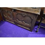 A period oak kist, converted to sideboard with Jacobean style panel doors and drawer to front, width