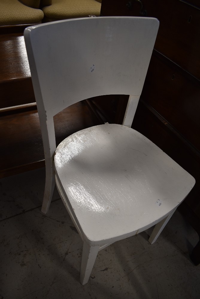 A pair of painted ply bentwood style chairs