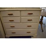 An early 20th century chest of four over two drawers in painted pine ideal for stripping