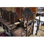 A set of six plus one carver early Victorian stately hall or similar castle style carved back oak