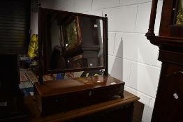 An early 20th Century mahogany toilet mirror having drawer base