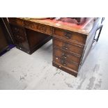 A reproduction Regency pedestal desk, leather inset (skiver) top, large proportions approx. 153 x