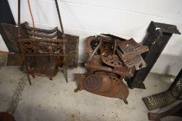 A selection of fire items including cast fireplace, fender and fire front