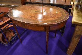 An Edwardian Sheraton revival style side table having typical inlay decoration throughout ,