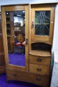 A hallway or similar arts and crafts / art nouveau dressing wardrobe having leaded light copper