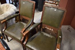 A pair of late 19th or early 20th Century oak carver chairs, possibly town hall or similar, having