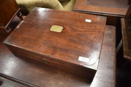 A 19th Century mahogany stationery box having plain brass cartouche, escutcheon and corner