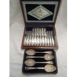 A canteen of twelve silver plated dessert knives and forks having mother of pearl handles and