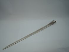 A Georgian silver meat skewer of traditional form having scallop decoration to loop handle,