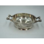 A silver ash tray of heavy bowl form having plannished finish, London 1946, Francis Adam, approx