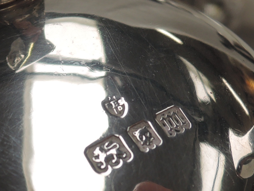 A 1920's silver four piece tea set of plain form having reided waists, lion mask paw feet and shaped - Image 4 of 4