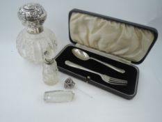 A small selection of HM silver and white metal including a cased child's spoon and fork, cut glass