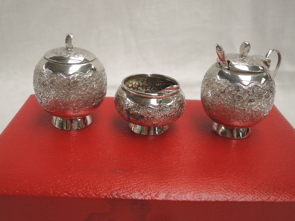 A cased Pakistani silver three piece cruet set of traditional Asian form, retailed by Kashmir Silver - Image 3 of 3