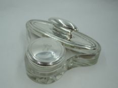 A glass dressing table nail buffer holder with integrated silver lidded pot bearing monogram G,