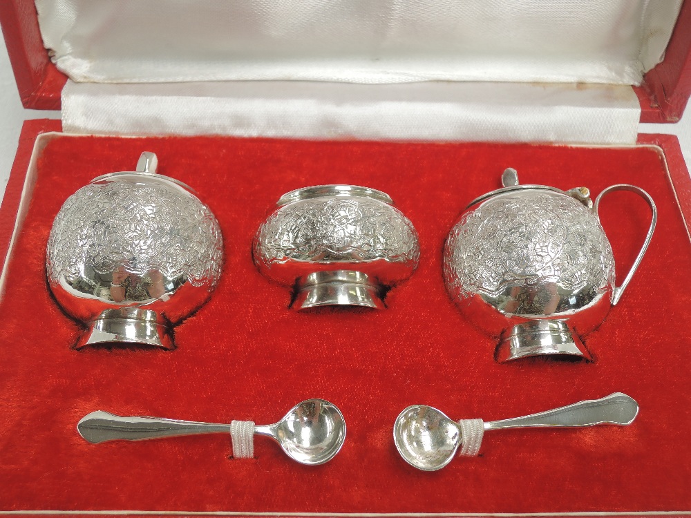 A cased Pakistani silver three piece cruet set of traditional Asian form, retailed by Kashmir Silver - Image 2 of 3