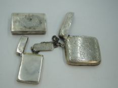 A Victorian silver box vesta of plain form bearing dated monograms to hinged lid, London 1881,