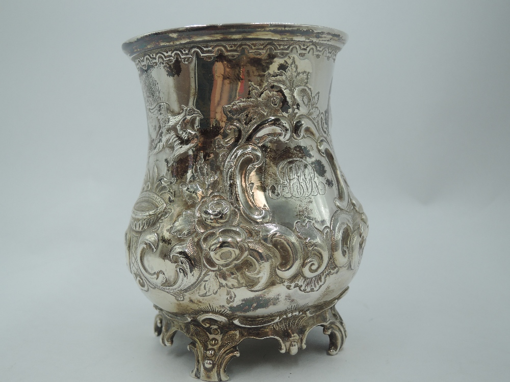 A Victorian silver Christening mug of baluster form having repousse floral, scroll and - Image 2 of 3