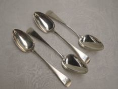 Four Georgian silver tablespoons (2 & 2) of Old English form bearing monograms to terminals,