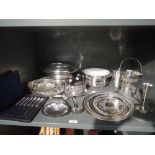 A selection of silver plate including lidded tureens, trays, cased butter knives, hip flasks, bottle