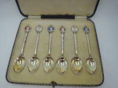 A cased set of six silver coffee spoons having enamelled terminals commemorating the Silver