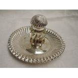 A Victorian silver inkstand having central moulded class inkwell with domed top on a gadrooned