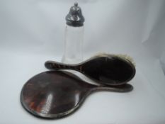 A silver and tortoise shell style dressing table brush and mirror with plain silver mount,