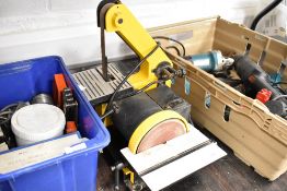 A Perform bench mounted belt and disc sander
