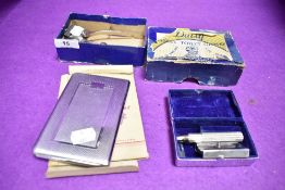 A machine tooled cigarette case and two vintage mens razors