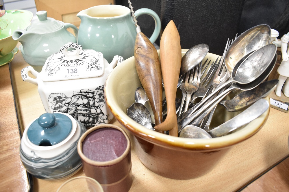 A selection of table and bake wares including cream pot cutlery and Denby jug