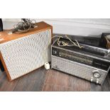 A Coumber Worcester F10 speaker cabinet and a Grundig Yacht boy radio set