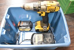 A Dewalt battery powered drill driver