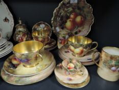 A selection of tea and coffee wares by Royal Worcester being hand decorated by various artists