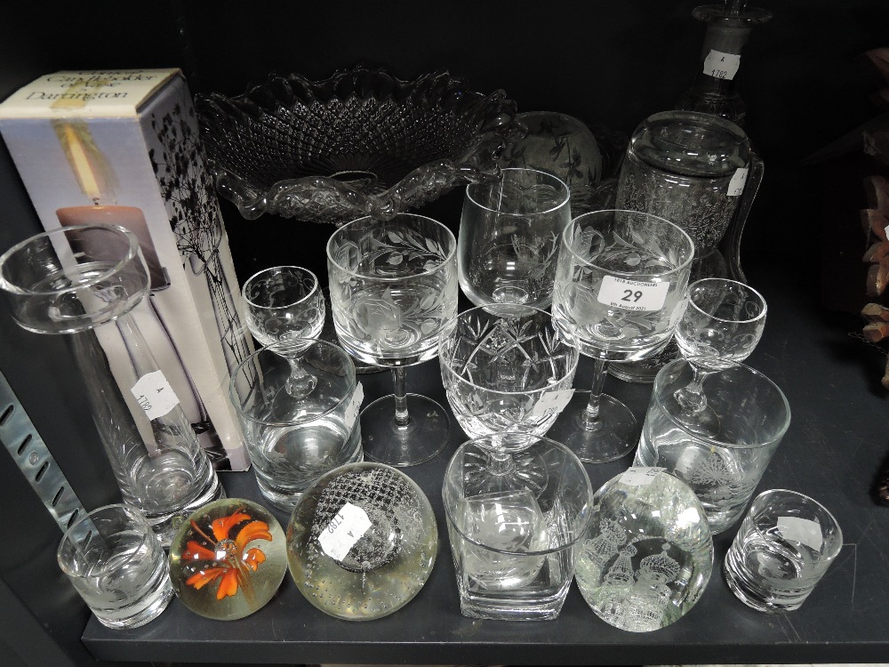 A selection of clear cut crystal glass wares including etched glasses and Scottish paper weight