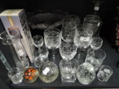 A selection of clear cut crystal glass wares including etched glasses and Scottish paper weight