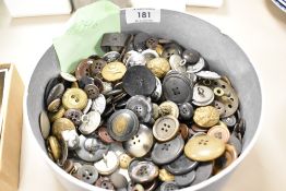 A selection of vintage buttons and similar including brass military and national fire service.