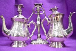 A three branch candelabra and plated tea and coffee pots