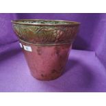 A Art Nouveau copper planter having grape and leaf rim design stamped for Keswick school of