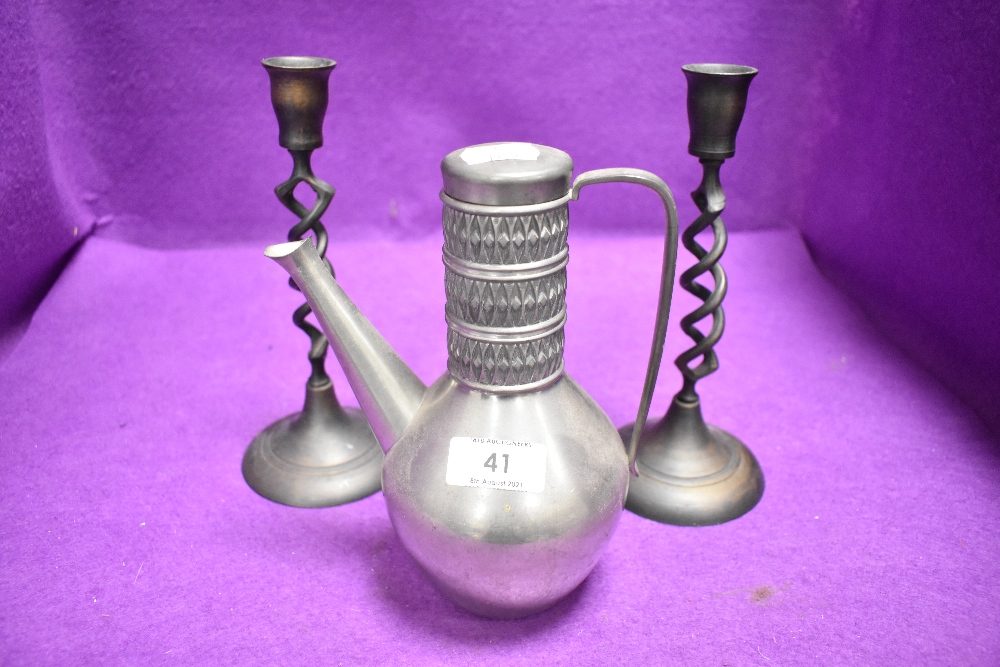 A Norway pewter Mastad tea or coffee pot and a pair of twist stem candle sticks