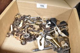 A selection of door furniture and clock keys
